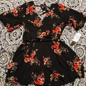 Super cute floral romper! Never worn!